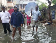 Our Managing Trustee visiting the flood affected houses